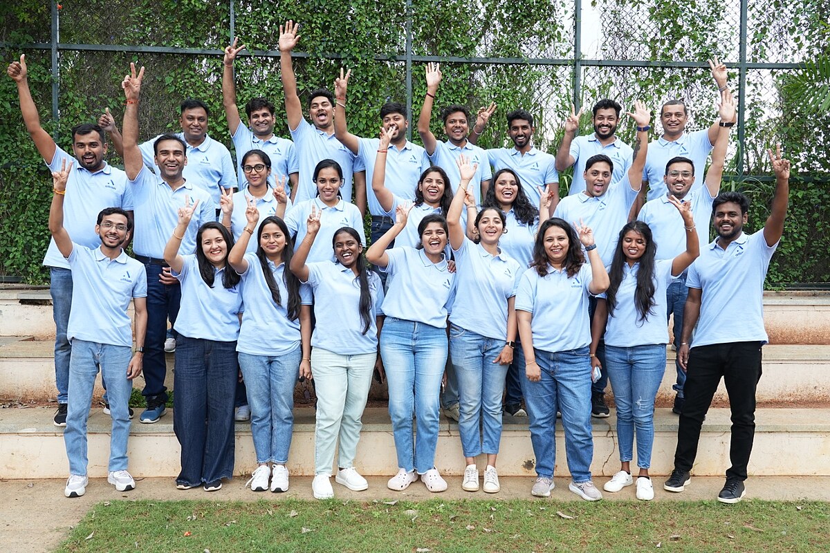 Attain team in blue shirts